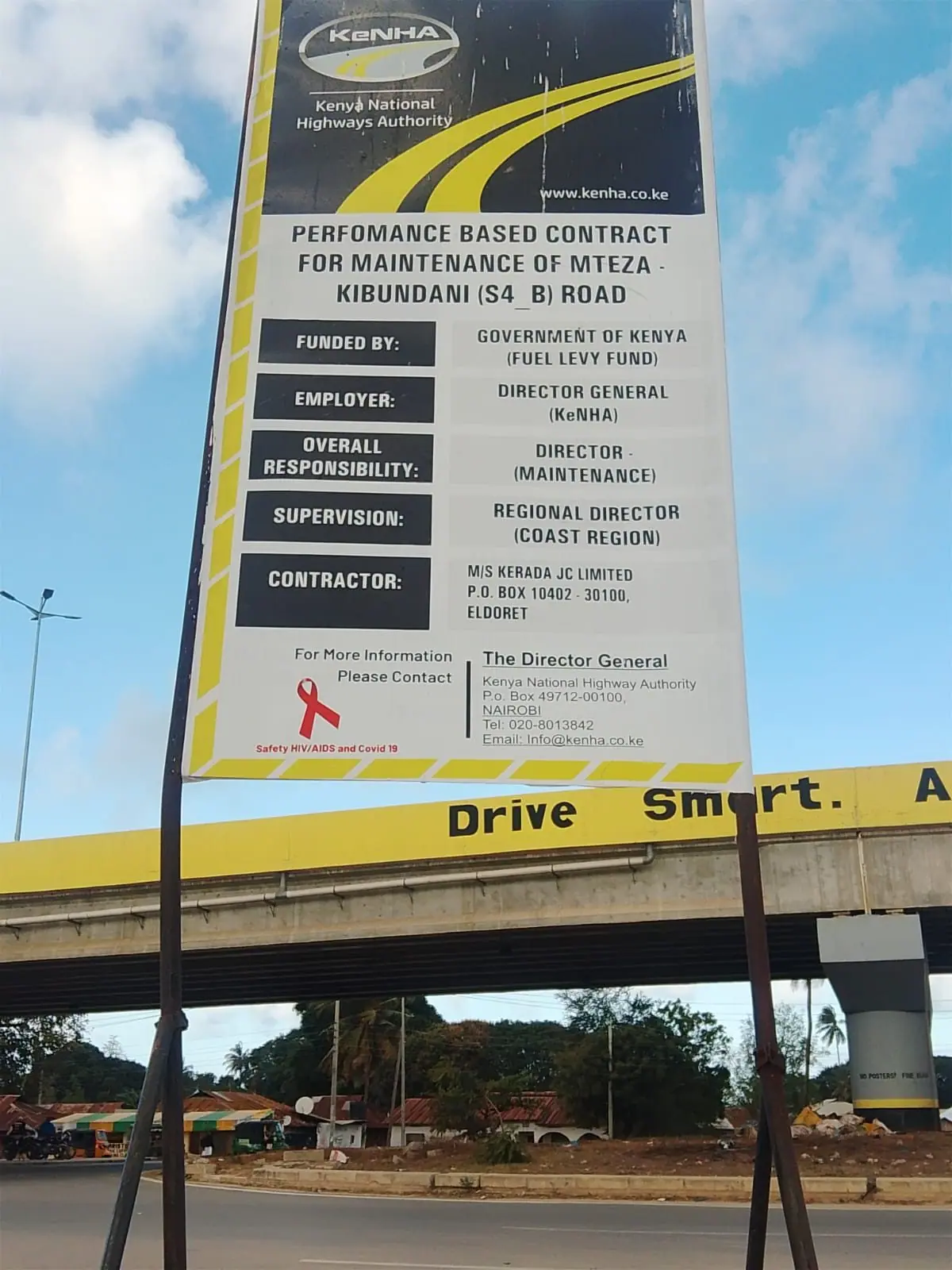 The KeNHA contract signboard for maintenance of the Mteza–Kibundani (S4_B) road, naming Kerada JC Limited as contractor